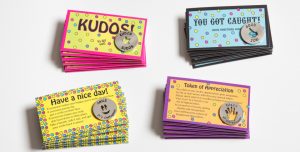 Array of kudos cards and tokens from Trainers Warehouse