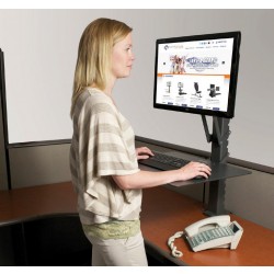 woman standing at stand-up desk