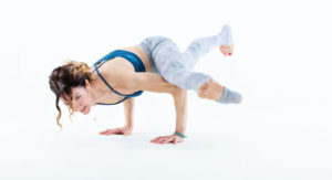 woman holds yoga balance