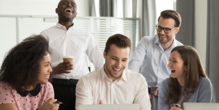 group of colleagues laughing with each other